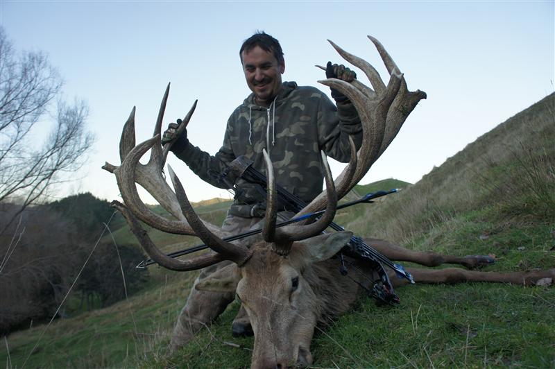 Justin Huckabay with his Red Stag taken by bow
